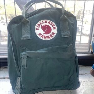 Fjallraven Kånken Mini Backpack in Dark Green with Red Logo